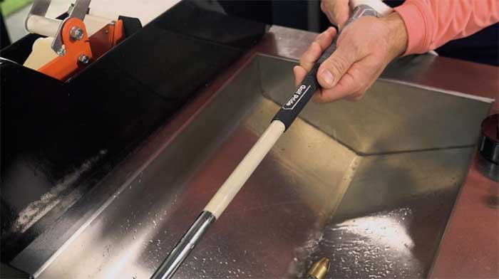 Sliding  ALIGN MAX grip over the taped shaft