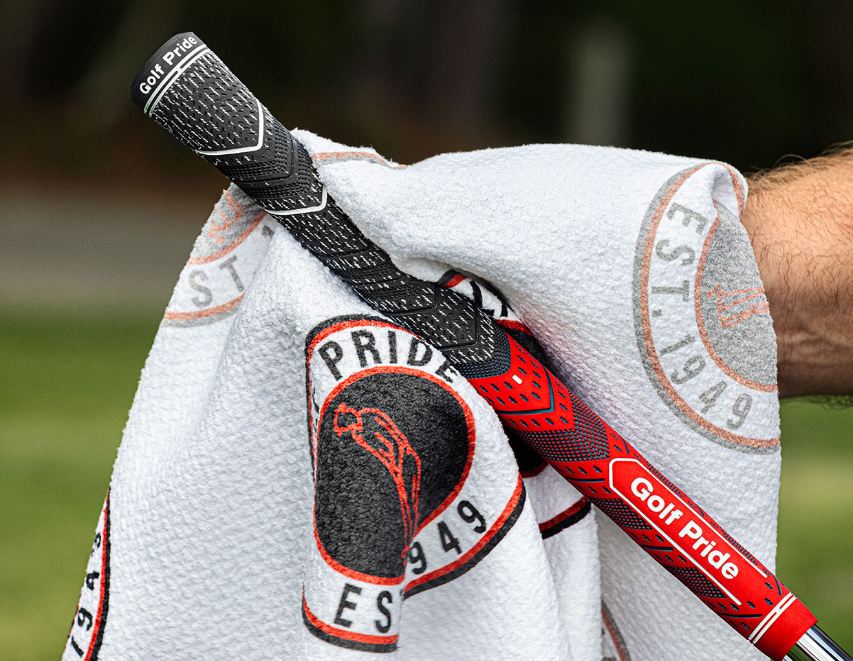 Wiping a grip down with a cloth