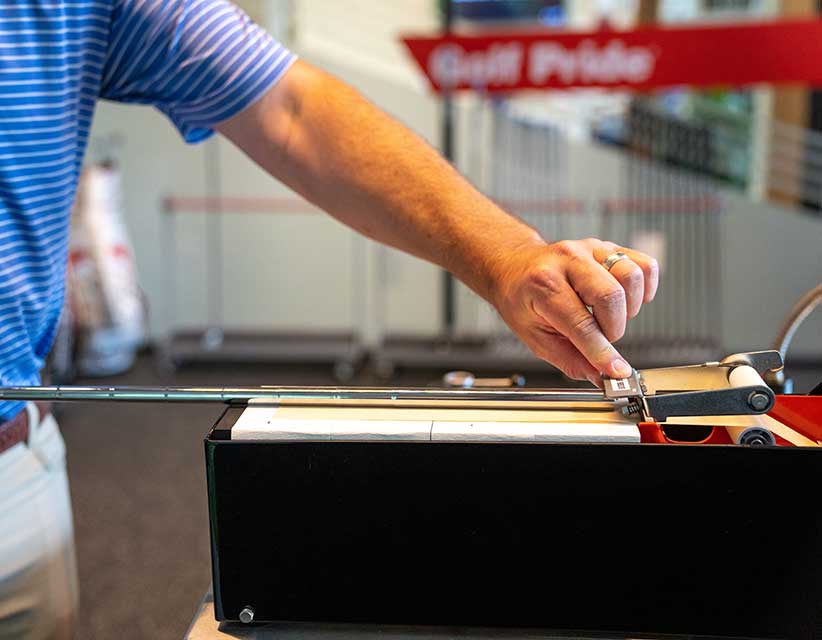 man regripping a club