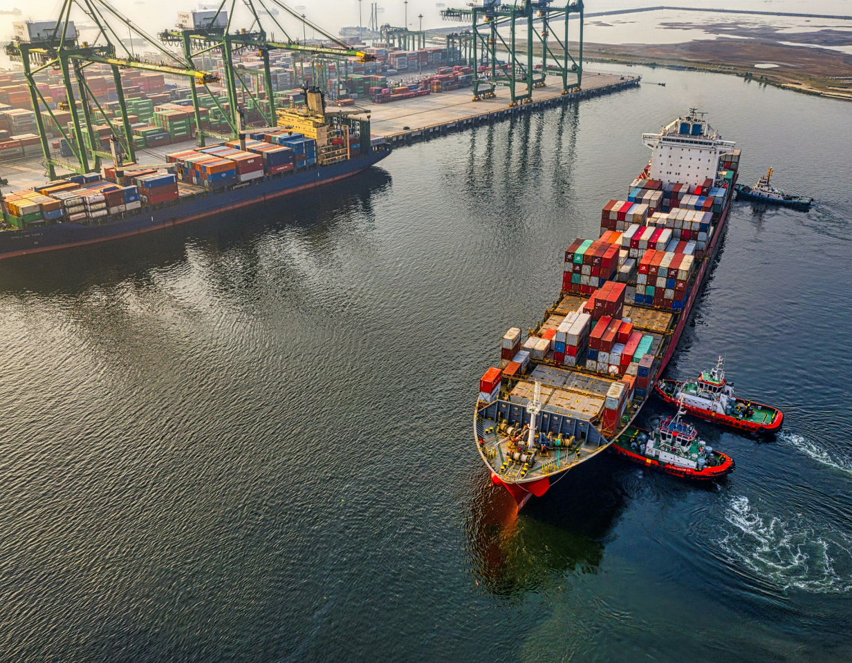 Shipping container boat at a port
