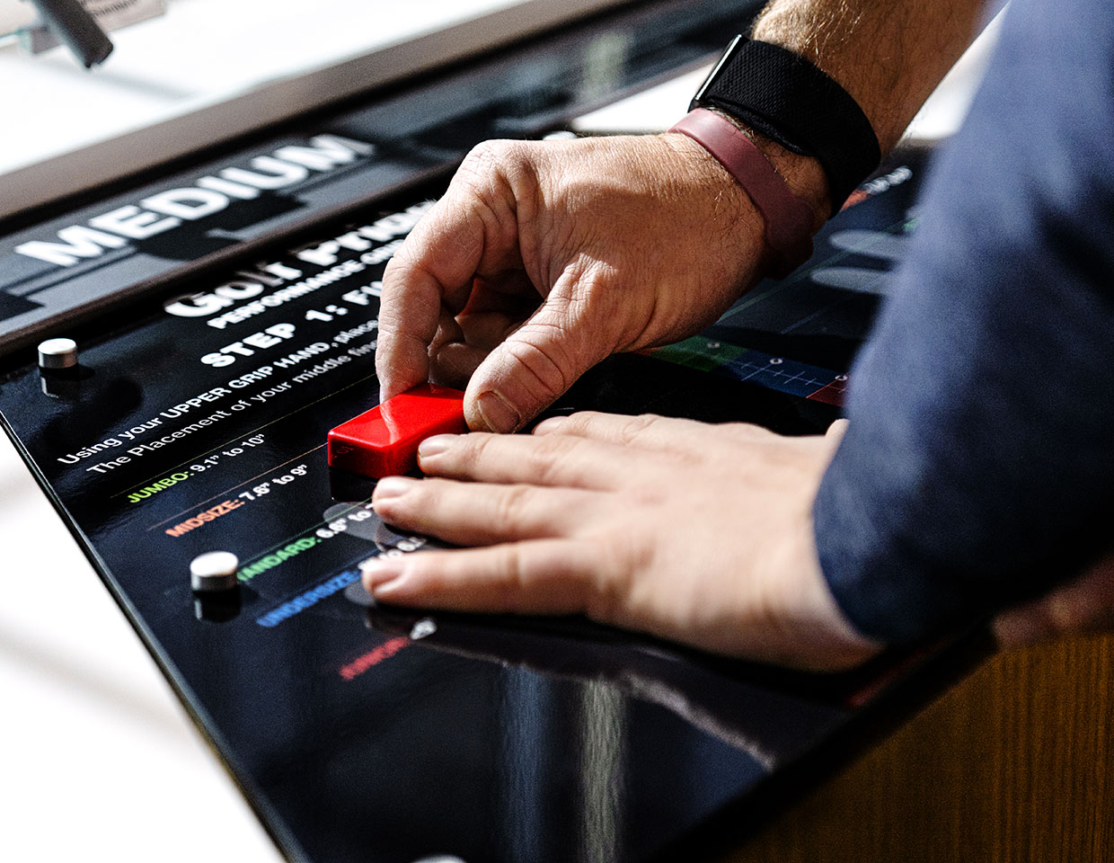 sizing someone's hand to find the right grip size