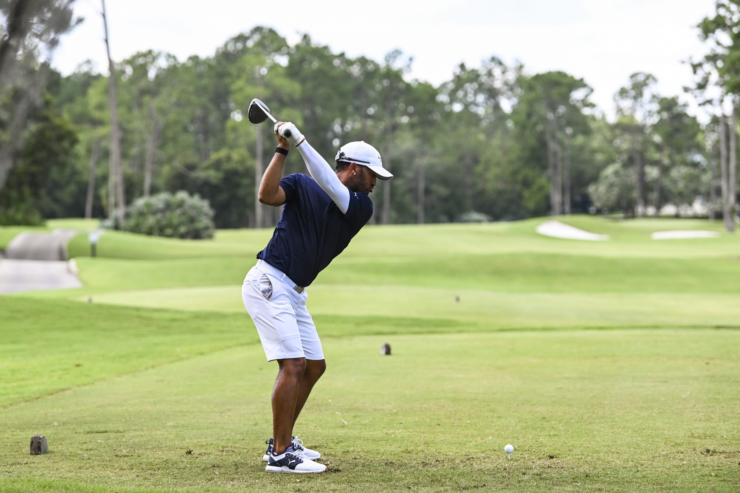 Willie Mack III hits a tee shot on the 10th hole during the final round of an APGA Tour